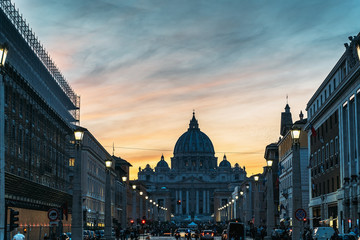 Saint Peter Basilica and Street Via della Conciliazione in evening city lights at sunset, Rome,...