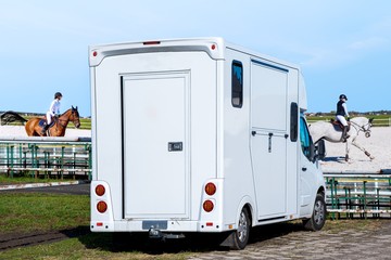 Horse transportation van . Funny horse transport . sports horse . the jockey operates a horse