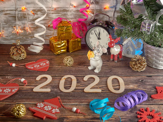 Happy new year 2020. Symbol: rat on wooden background.