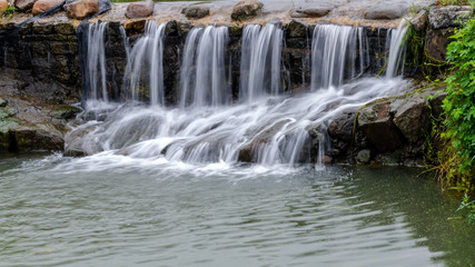 Fototapeta premium Small waterfall in Songxi village. Pujang county. China