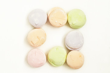 Air marshmallows in pastel shades. A gentle marshmallows.  Marshmallows that you want to eat. A gentle zephyr on a white background. Marshmallows in a light key.