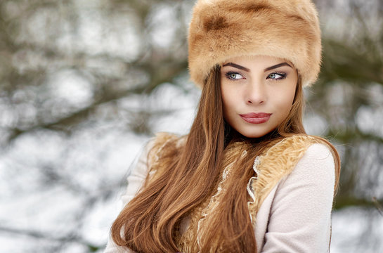 Elegant beautiful winter woman portrait. Copy space. Close up