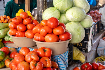 Tomato, cabbages and other vegetables in the market.