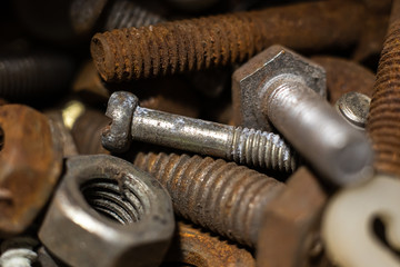 Rusty metal nuts and bolts. Macro.