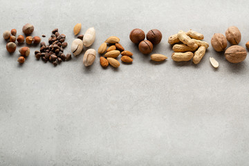Organic nuts mix on gray background and copy space