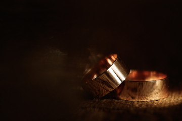 Gold wedding rings. The concept of marriage, family relationships, wedding paraphernalia.