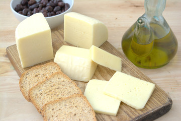 Typical cow cheese from Spain on a wooden board