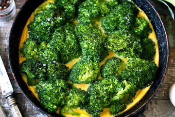 Broccoli casserole. Keto diet. Omelet with broccoli and eggs. Broccoli frittata. Selective focus....