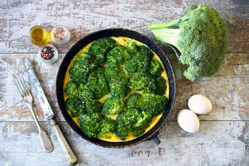 Broccoli casserole. Keto diet. Omelet with broccoli and eggs. Broccoli frittata. Selective focus. Macro.