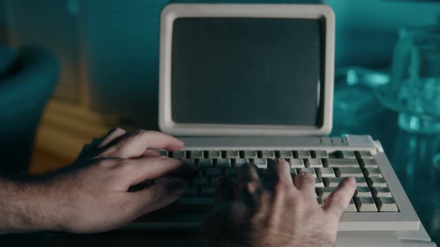 typing on black computer retro 80s style