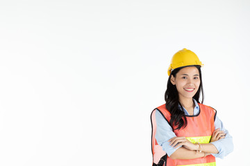 Female engineer wearing safety hat and carry construction plan