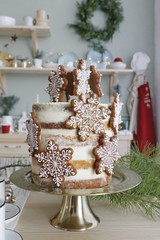 Christmas dessert, cake with gingerbread snowflakes