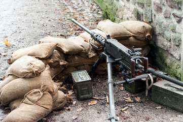 Closeup of american machine gun during the world war two reconstitution for the 75 th anniversary of the liberation of Alsace in France