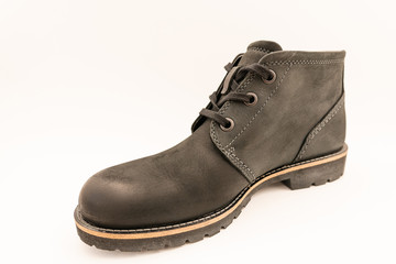 vintage black boots on white background, retro shoes