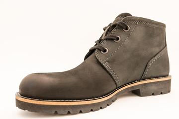 vintage black boots on white background, retro shoes