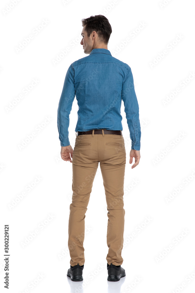 Poster back view of smart casual man looking to side