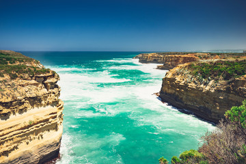 Loch Ard Gorge Australia cliff with blue sea and sky