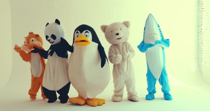 Polar bear and animal mascots characters with a message for humanity, about global warming and pollution problems on our planet