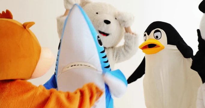 Polar bear and animal mascots characters with a message for humanity, about global warming and pollution problems on our planet