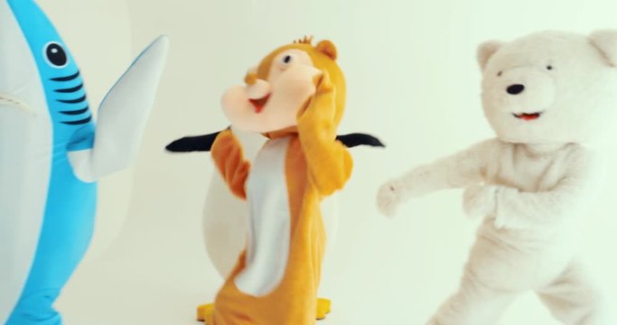 Polar bear and animal mascots characters with a message for humanity, about global warming and pollution problems on our planet