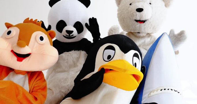 Polar bear and animal mascots characters with a message for humanity, about global warming and pollution problems on our planet