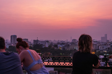 Hanoi city Skyline and cityscape captured during a beautiful Vietnamese sunset in October of 2019 from a skybar.
