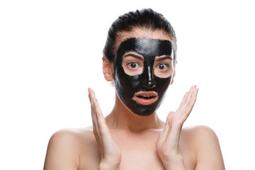 girl with black cosmetic mask on face