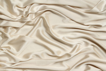 silk knitted fabric softly draped with small folds, texture, background, form for postcard, copy space