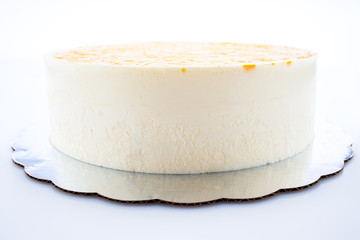 Chocolate cake with decoration and fruits as background