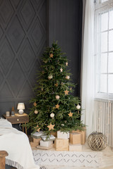 Christmas tree. decorated Christmas tree lights up. new year's interior. new year. Christmas