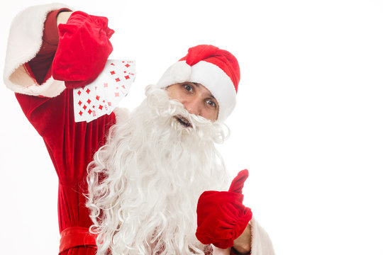 Santa Claus With Playing Cards On White Background