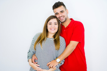 Naklejka premium Young beautiful couple together over white isolated background with a happy and cool smile on face. Lucky person.