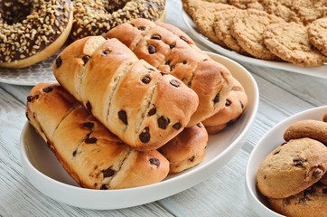 Sweet delicious dessert. Fresh butter muffins with chocolate.