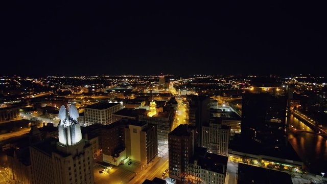 Rochester New York Aerial v3 Counter clockwise panoramic nighttime cityscape view of downtown near Genesee River - October 2017