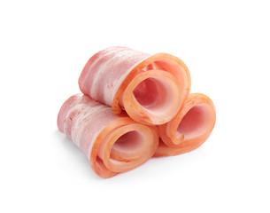Slices of raw bacon on white background