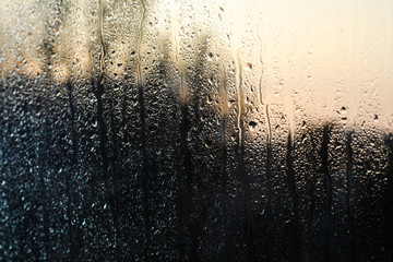 Rain drops on window glass as background, closeup