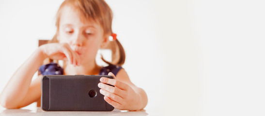 Social networks, friendship, technology and children concept. Portrait of young beautiful girl...