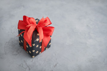 Polka dot Gift box with red ribbon