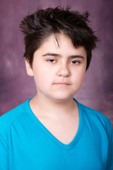 Portrait of a boy with tousled hair