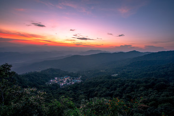 Natural scenery background, high angle on the top of the hill, can see a variety of mountains, various plants, blurred through the wind while watching nature, seen in rural tourist attractions.