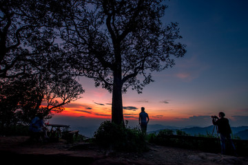 Natural scenery background, high angle on the top of the hill, can see a variety of mountains, various plants, blurred through the wind while watching nature, seen in rural tourist attractions.