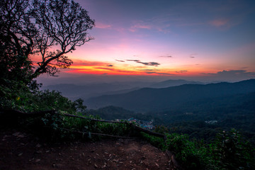 Fototapeta premium Natural scenery background, high angle on the top of the hill, can see a variety of mountains, various plants, blurred through the wind while watching nature, seen in rural tourist attractions.