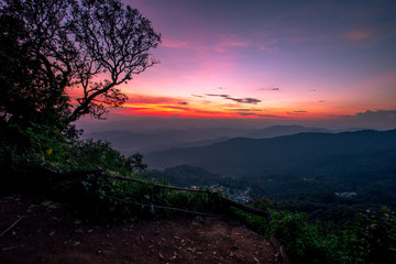 Natural scenery background, high angle on the top of the hill, can see a variety of mountains, various plants, blurred through the wind while watching nature, seen in rural tourist attractions.