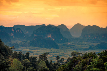 Natural scenery background, high angle on the top of the hill, can see a variety of mountains, various plants, blurred through the wind while watching nature, seen in rural tourist attractions.