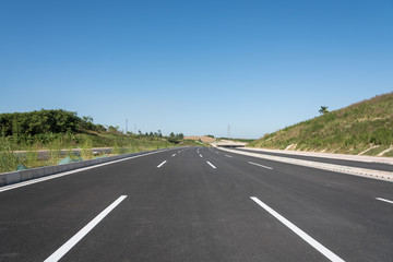 Brand new asphalt road horizon cloudless perspective landscape