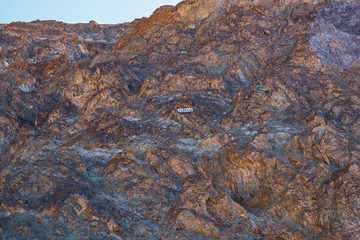 Badwater Basin in Death Valley. Sea level sign that is located 280 feet above you on the adjacent mountain