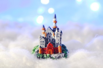 Fototapeta na wymiar christmas and newyear. Princess castle in white cloud.