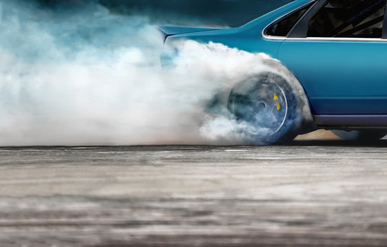 Race drift car burning tires on speed track © toa555