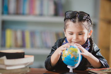 foreigner girl learning in the classroom with happy.