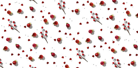 Christmas seamless pattern with red balls, berries, decoration, sparkles and confetti on white background. Xmas and New Year greeting card, winter holiday. Flat lay, top view, harsh shadow